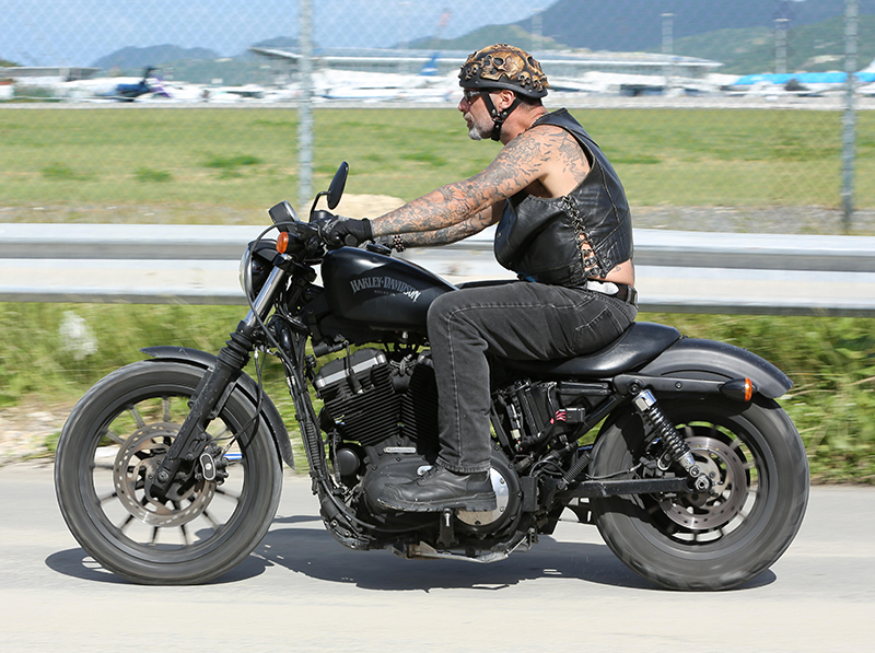 Harley Davidson rider wearing leather vest